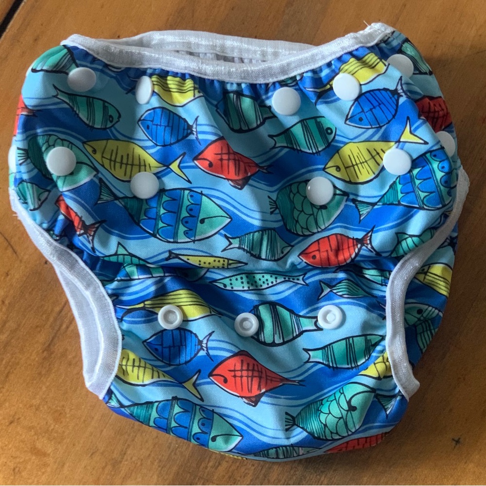 Adjustable swim diaper cover